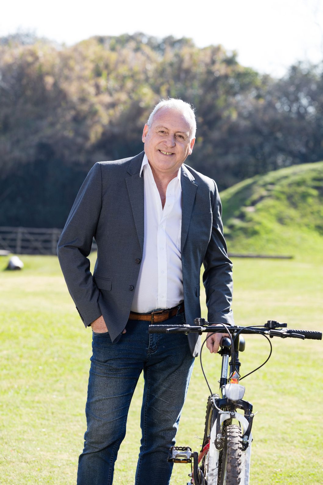 elegant-senior-businessman-his-bike(1)